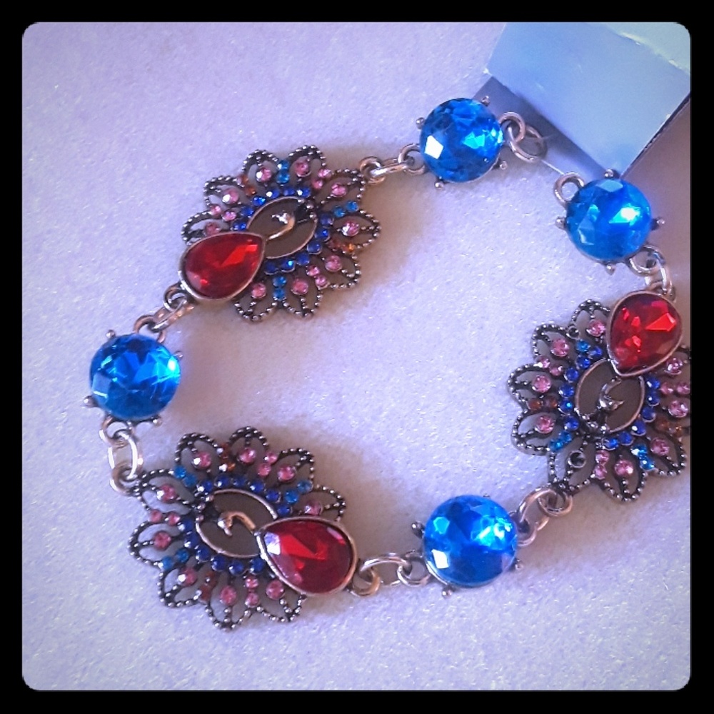 Peacock gem connector strand 7 in
